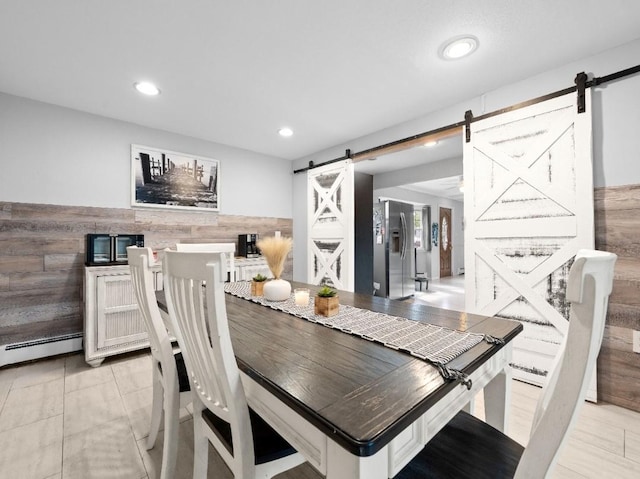 33 Saddle Ln, Levittown, NY 11756 - dining room with a barn door, recessed lighting, and baseboard heating