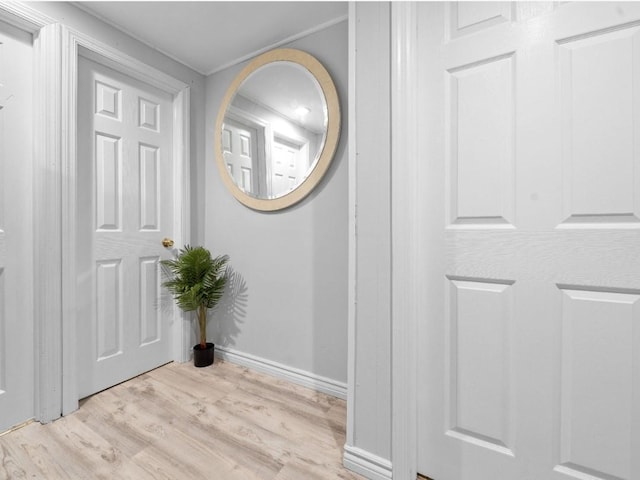 33 Saddle Ln, Levittown, NY 11756 - hall with wood finished floors and baseboards