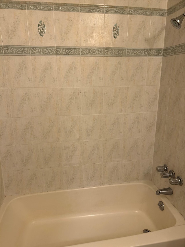 full bathroom featuring tub / shower combination
