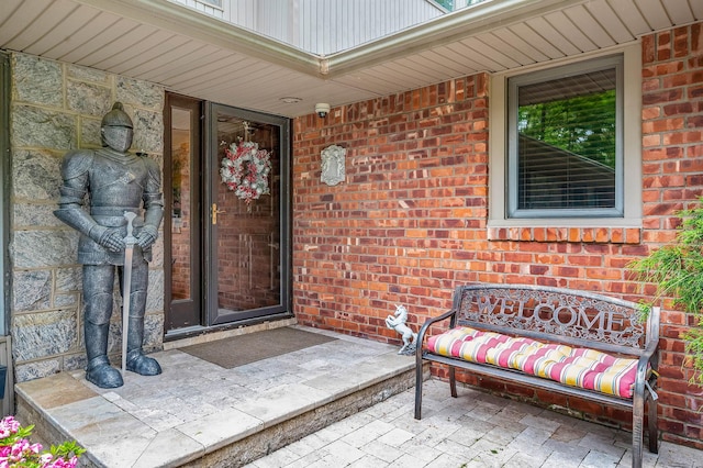 2 Farmview Dr, Dix Hills, NY 11746 - view of exterior entry featuring brick siding and stone siding