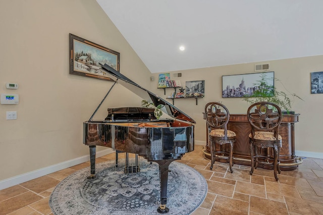 2 Farmview Dr, Dix Hills, NY 11746 - living area with vaulted ceiling, baseboards, stone tile floors, a dry bar, and recessed lighting