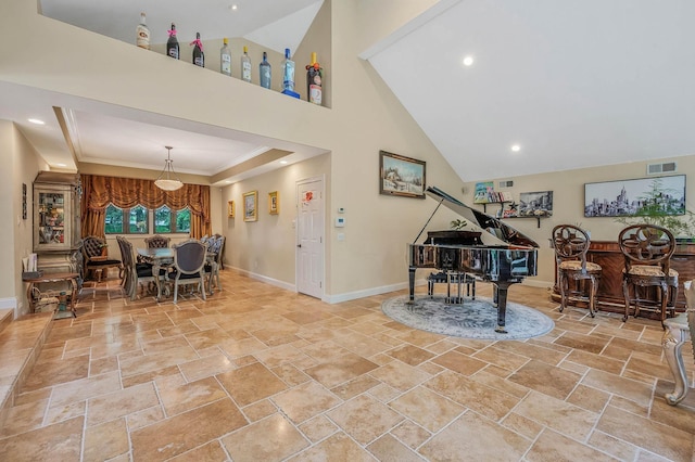 2 Farmview Dr, Dix Hills, NY 11746 - living room featuring stone tile flooring, baseboards, a bar, a towering ceiling, and crown molding