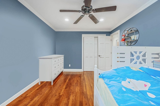 2 Farmview Dr, Dix Hills, NY 11746 - bedroom with wood finished floors, baseboards, ornamental molding, a closet, and recessed lighting