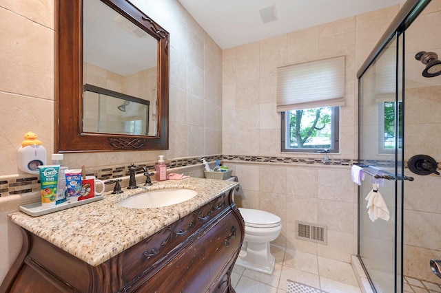 2 Farmview Dr, Dix Hills, NY 11746 - full bath with tile walls, vanity, a stall shower, tile patterned flooring, and toilet