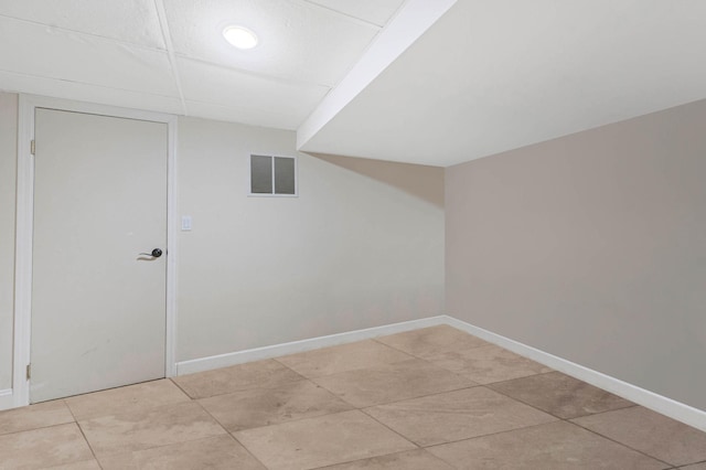 2 Farmview Dr, Dix Hills, NY 11746 - additional living space with light tile patterned flooring and baseboards