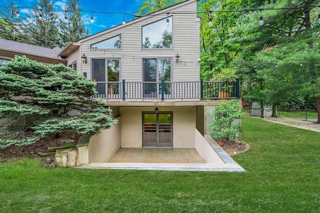 2 Farmview Dr, Dix Hills, NY 11746 - rear view of property with a wooden deck, a lawn, and stucco siding