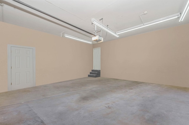 2 Farmview Dr, Dix Hills, NY 11746 - garage featuring a garage door opener