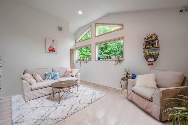 2 Farmview Dr, Dix Hills, NY 11746 - living room with wood finished floors, baseboards, high vaulted ceiling, and recessed lighting