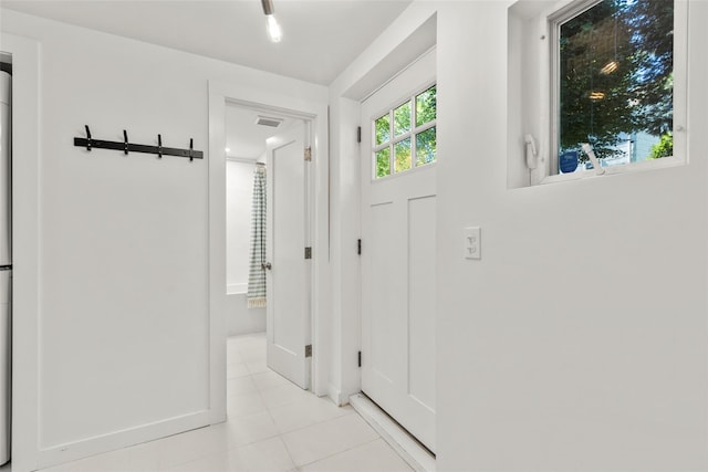 51/2 Locust Ave, Stony Brook, NY 11790 - corridor featuring light tile patterned floors and baseboards