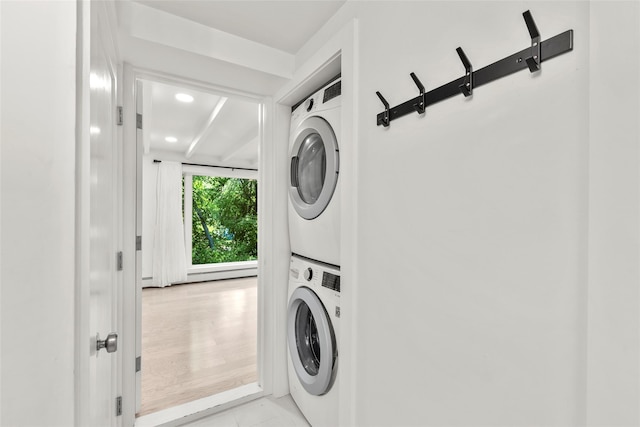 51/2 Locust Ave, Stony Brook, NY 11790 - washroom featuring stacked washer and clothes dryer and recessed lighting
