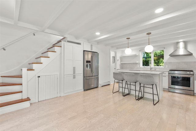 51/2 Locust Ave, Stony Brook, NY 11790 - kitchen with stainless steel appliances, open shelves, a baseboard radiator, beamed ceiling, and white cabinets