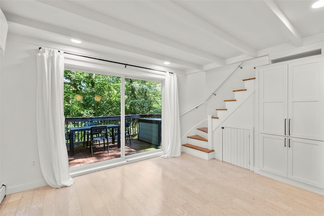 51/2 Locust Ave, Stony Brook, NY 11790 - unfurnished room with beamed ceiling, wood finished floors, stairway, recessed lighting, and baseboards