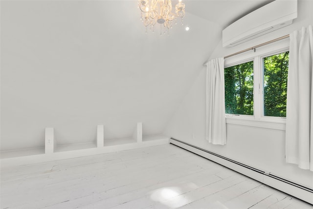 51/2 Locust Ave, Stony Brook, NY 11790 - unfurnished room with baseboard heating, a wall mounted air conditioner, vaulted ceiling, a chandelier, and wood finished floors