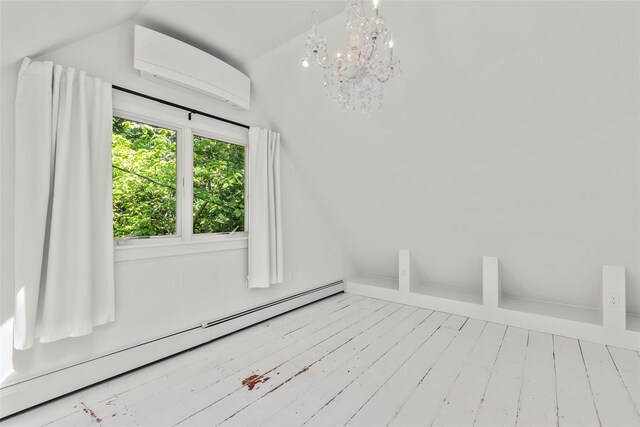 51/2 Locust Ave, Stony Brook, NY 11790 - unfurnished dining area featuring baseboard heating, lofted ceiling, a wall mounted AC, a chandelier, and wood-type flooring