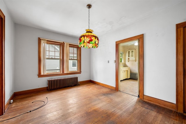 16 Oak Ter, Suffern, NY 10901 - spare room featuring radiator, baseboards, and hardwood / wood-style flooring