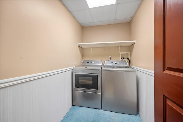 178 Prospect Pl, Bay Shore, NY 11706 - laundry room featuring washing machine and dryer, a wainscoted wall, and carpet flooring