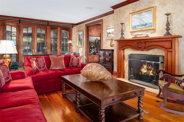 118 John St, Greenwich, CT 06831 - living area featuring ornamental molding, hardwood / wood-style floors, and a premium fireplace
