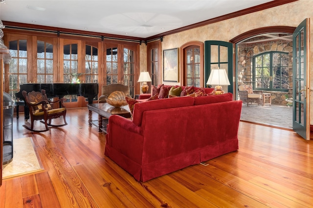 118 John St, Greenwich, CT 06831 - living area with wood finished floors, crown molding, and french doors