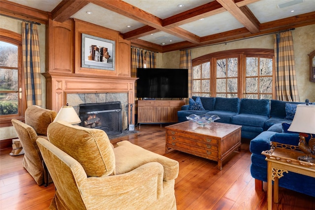 118 John St, Greenwich, CT 06831 - living room featuring beamed ceiling, light wood finished floors, coffered ceiling, and a premium fireplace