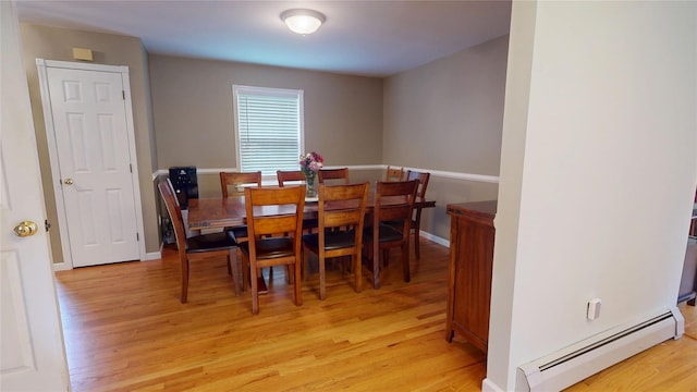 10 Courtney Ln, Brewster, NY 10509 - dining space featuring baseboard heating, light wood-style flooring, and baseboards