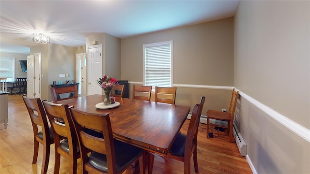 10 Courtney Ln, Brewster, NY 10509 - dining area with light wood-type flooring, a baseboard radiator, and baseboards