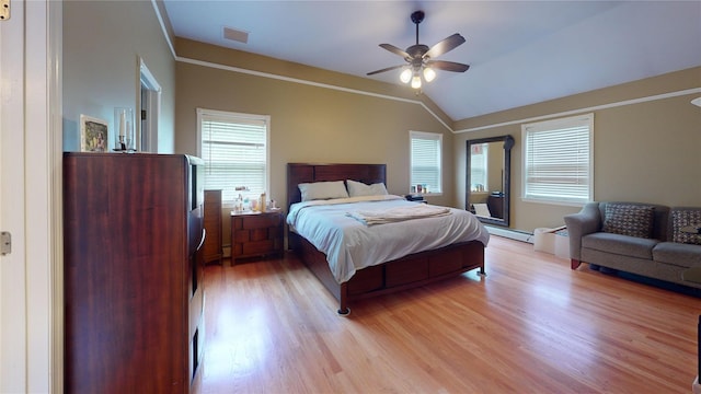 10 Courtney Ln, Brewster, NY 10509 - bedroom with vaulted ceiling, light wood finished floors, a baseboard radiator, ornamental molding, and a ceiling fan