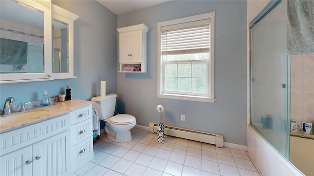10 Courtney Ln, Brewster, NY 10509 - full bath featuring a baseboard heating unit, tile patterned floors, toilet, vanity, and baseboards