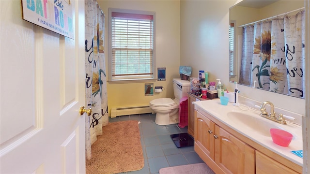 10 Courtney Ln, Brewster, NY 10509 - full bath with a baseboard heating unit, tile patterned flooring, vanity, and toilet