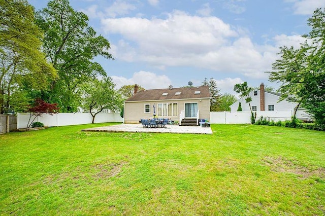 rear view of property featuring entry steps and a patio area