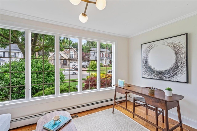 office with crown molding, wood finished floors, and a baseboard radiator