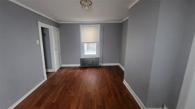 164 Thompson St, Poughkeepsie, NY 12601 - unfurnished room with radiator, wood finished floors, baseboards, and ornamental molding