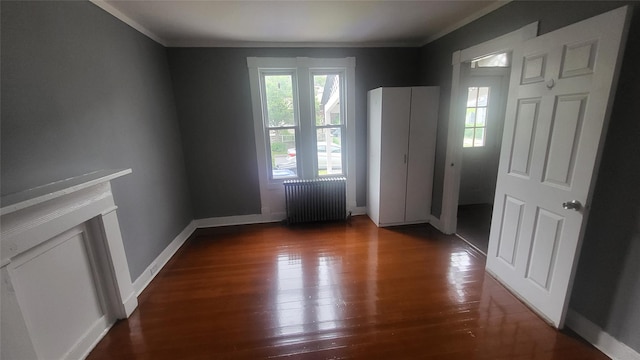 164 Thompson St, Poughkeepsie, NY 12601 - interior space featuring radiator, hardwood / wood-style floors, ornamental molding, and baseboards