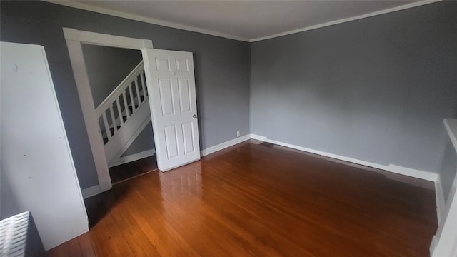 164 Thompson St, Poughkeepsie, NY 12601 - spare room with stairs, wood finished floors, crown molding, and baseboards