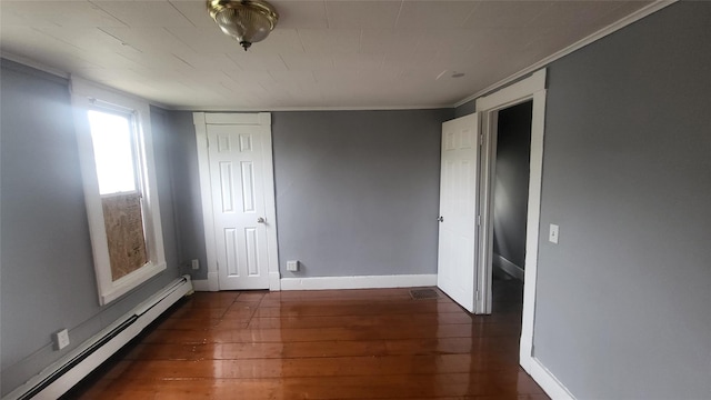 164 Thompson St, Poughkeepsie, NY 12601 - unfurnished room featuring a baseboard radiator, wood-type flooring, baseboards, and crown molding