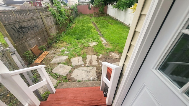 164 Thompson St, Poughkeepsie, NY 12601 - fenced backyard with a wooden deck