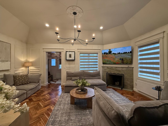 1821 Tenbroeck Ave, Bronx, NY 10461 - living room with a chandelier, a fireplace, high vaulted ceiling, recessed lighting, and a decorative wall