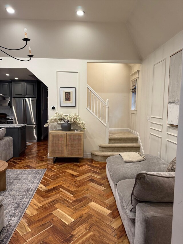 1821 Tenbroeck Ave, Bronx, NY 10461 - living area featuring stairway, vaulted ceiling, baseboards, and recessed lighting