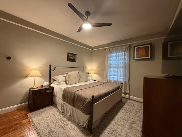 1821 Tenbroeck Ave, Bronx, NY 10461 - bedroom with baseboards, wood finished floors, and ceiling fan