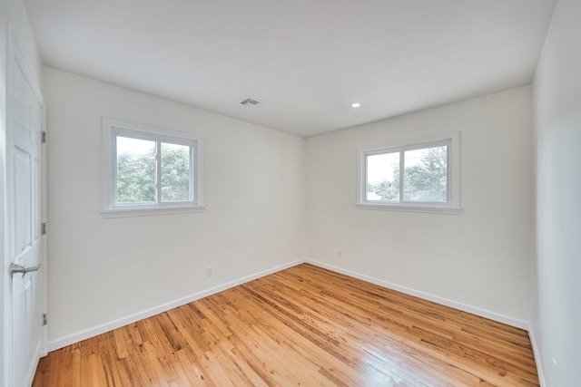 48 Hillside Ave, Patchogue, NY 11772 - spare room with baseboards, light wood finished floors, and recessed lighting