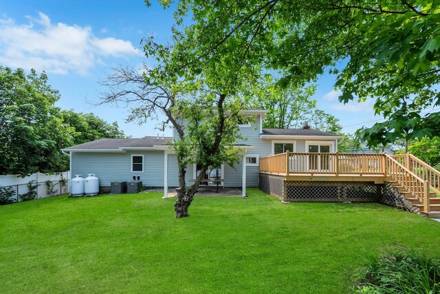 48 Hillside Ave, Patchogue, NY 11772 - rear view of house featuring a deck