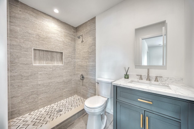 48 Hillside Ave, Patchogue, NY 11772 - full bathroom featuring toilet, a tile shower, and vanity