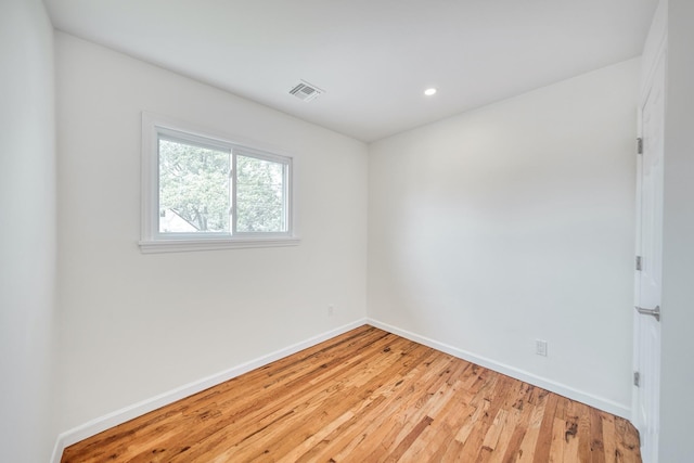 48 Hillside Ave, Patchogue, NY 11772 - spare room featuring baseboards, light wood-style flooring, and recessed lighting