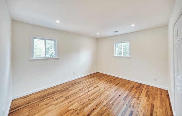 48 Hillside Ave, Patchogue, NY 11772 - unfurnished bedroom featuring light wood-style floors, baseboards, and recessed lighting