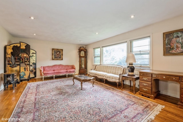 7 Ivy Ln, Lawrence, NY 11559 - living area with light wood-type flooring, recessed lighting, and baseboards