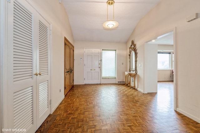 7 Ivy Ln, Lawrence, NY 11559 - entrance foyer with baseboards and vaulted ceiling