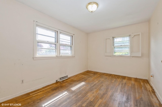 7 Ivy Ln, Lawrence, NY 11559 - empty room featuring hardwood / wood-style flooring and baseboards