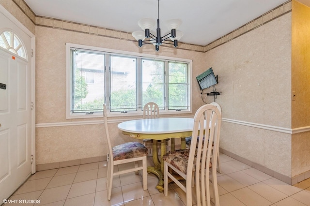 7 Ivy Ln, Lawrence, NY 11559 - dining space with a chandelier and light tile patterned flooring