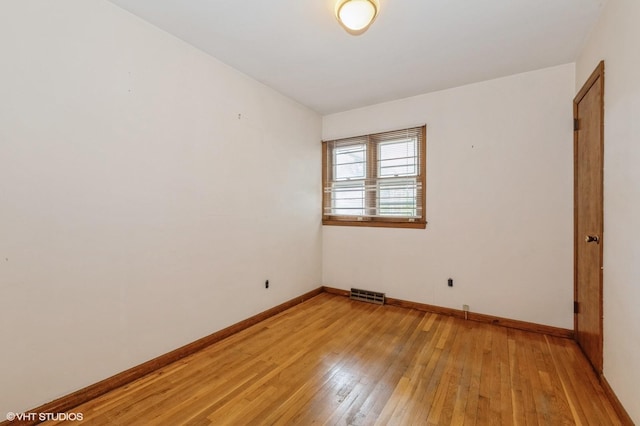 7 Ivy Ln, Lawrence, NY 11559 - unfurnished room with light wood finished floors and baseboards