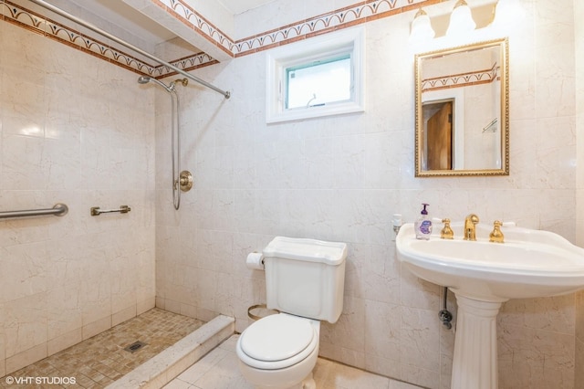 7 Ivy Ln, Lawrence, NY 11559 - bathroom with a stall shower, toilet, tile walls, and tile patterned floors