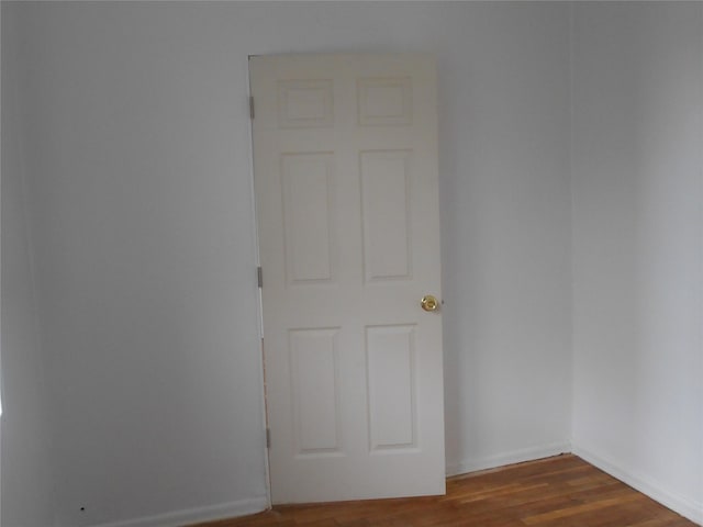 131-11KEWGARDENS Kew Gardens Rd Unit 4D, Richmond Hill, NY 11418 - unfurnished room featuring wood finished floors and baseboards